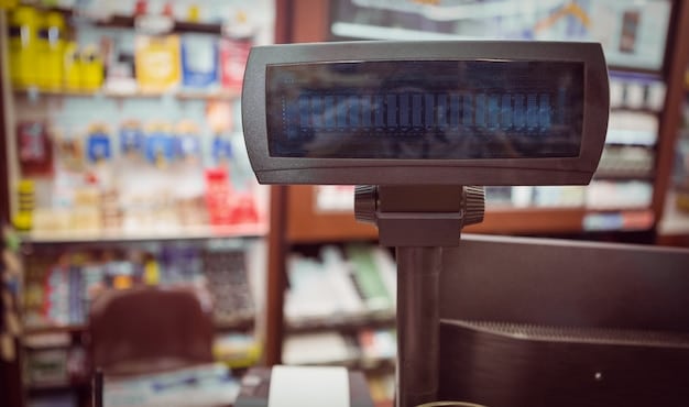 A close-up image of a cash register displaying a discounted price with a percentage sign, highlighting the reduced VAT rate.  A blurred background shows a busy retail environment.