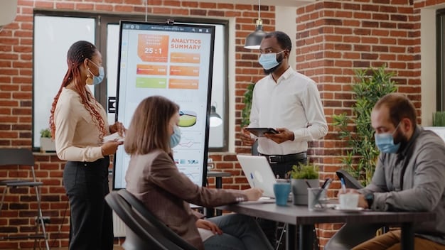 A diverse team of professionals collaborating around a digital whiteboard, brainstorming strategies for digital transformation in a modern office setting.