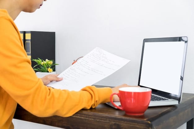 A person sitting at a desk, filling out an online application form on a laptop. The laptop screen displays the BAFA (German Federal Office for Economic Affairs and Export Control) website with a highlighted section for electric vehicle subsidies. The scene is well-lit and organized, emphasizing the ease and accessibility of the online application process.