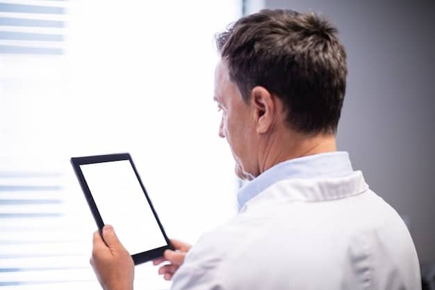 A close-up shot of a doctor in a German hospital using a tablet to access patient records while discussing treatment options with a patient during consultation. The image shows modern technology being used in healthcare with empathy.