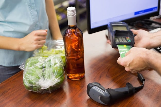 A close-up of a barcode scanner on a product in a supermarket, symbolizing changes in VAT rates and how they impact consumers and businesses. The scanner is focused, with blurred products in the background.