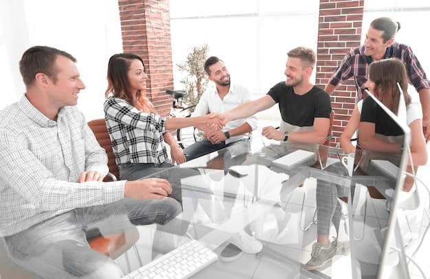 A group of young professionals discussing ideas in a brightly lit, modern office space, symbolizing the importance of attracting and retaining young talent.